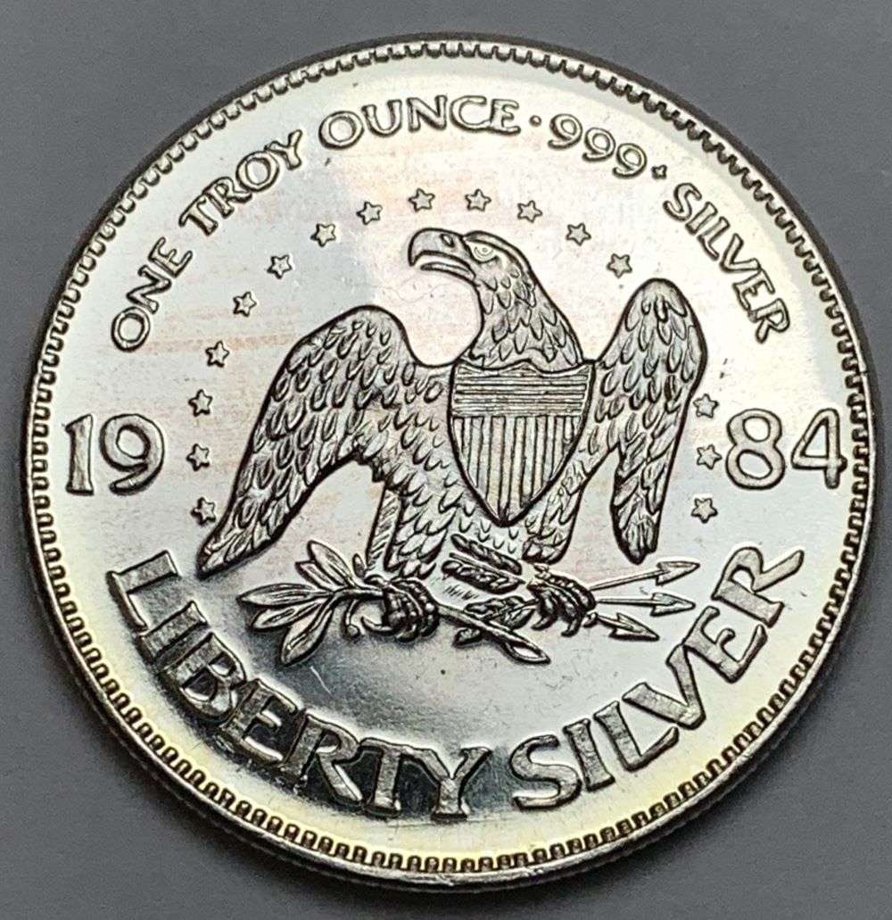 1984 A-Mark "Life Liberty Happiness" Proof 1 ozt .999 Silver: Winner shall receive the exact coin shown here. (EP/B)