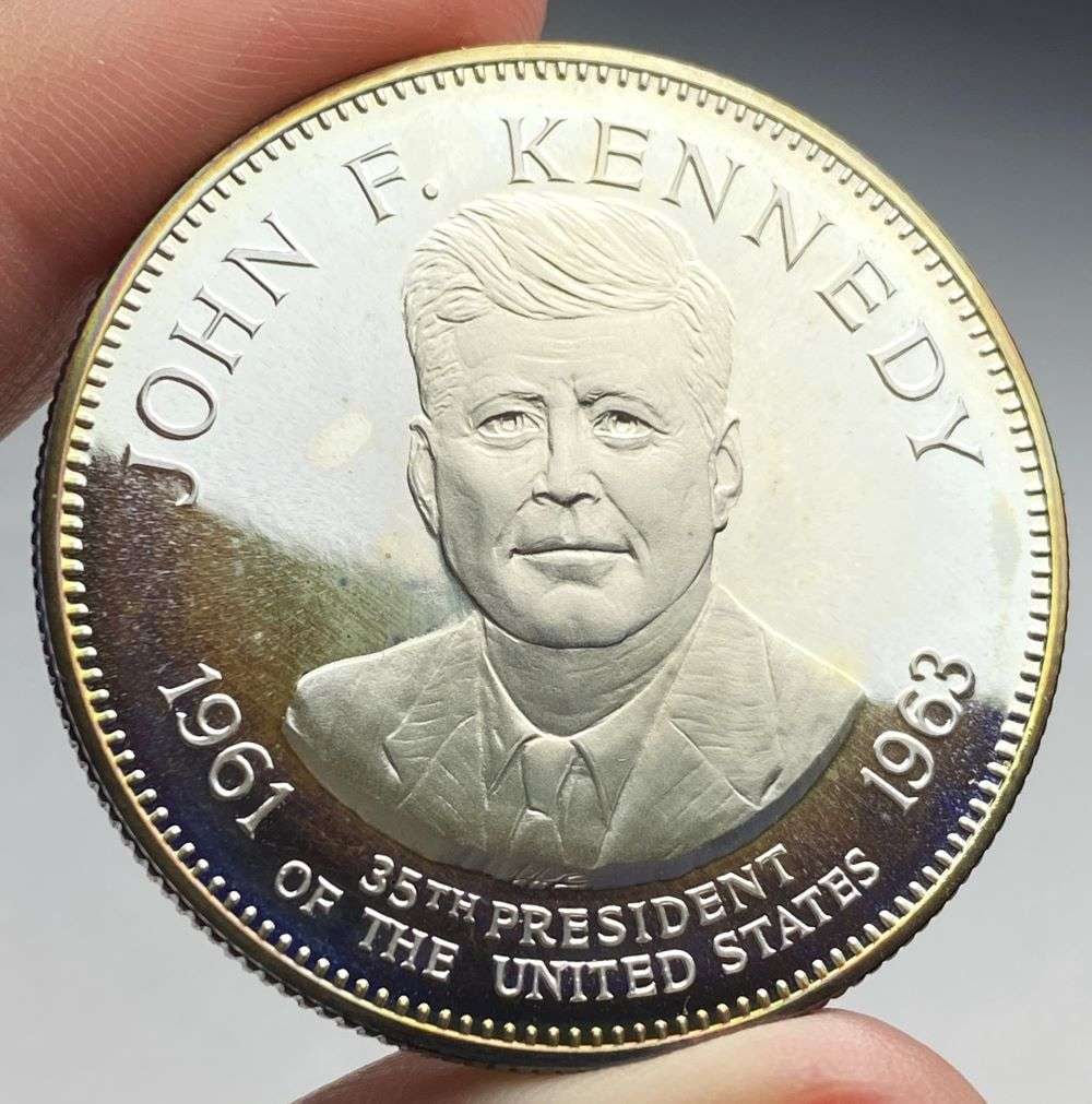 John F. Kennedy 35th President Of The United States Proof Sterling Silver 1 ozt: Winner shall receive the exact coin shown here. (RR/B)