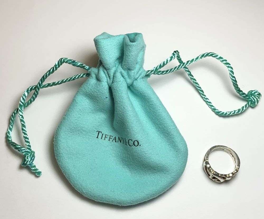 Tiffany & Co. Paloma Picasso Loving Heart Band .925 Sterling Silver: This ring is a size 4. Winner shall receive the exact item shown here. (EP)