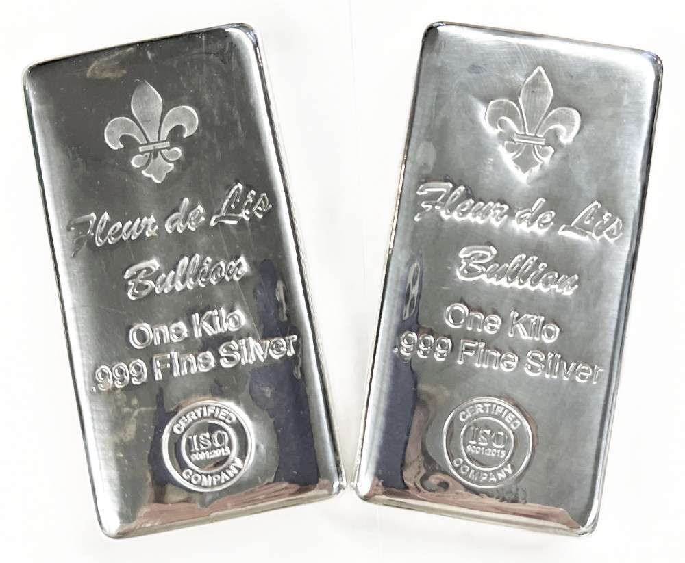 (2) Kilo .999 Proof Fleur De Lis Silver Bars: This item comes from our consignors vault in St. Louis. Please allow 2-4 weeks for delivery. Winner shall receive (2) bars, precisely resembling the bars shown here.