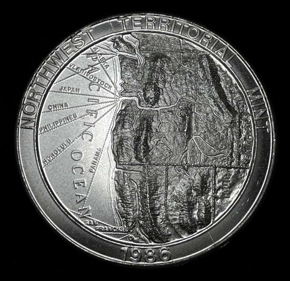 Extremely Rare Vintage 1986 NWTM 1 ozt .999 Silver Trade Unit: I have never seen or heard of these 1986 rounds before. It is quit interesting if you type in the name Ross Hanson into Google. Winner shall receive (1) coin precisely resembling the one shown here. (