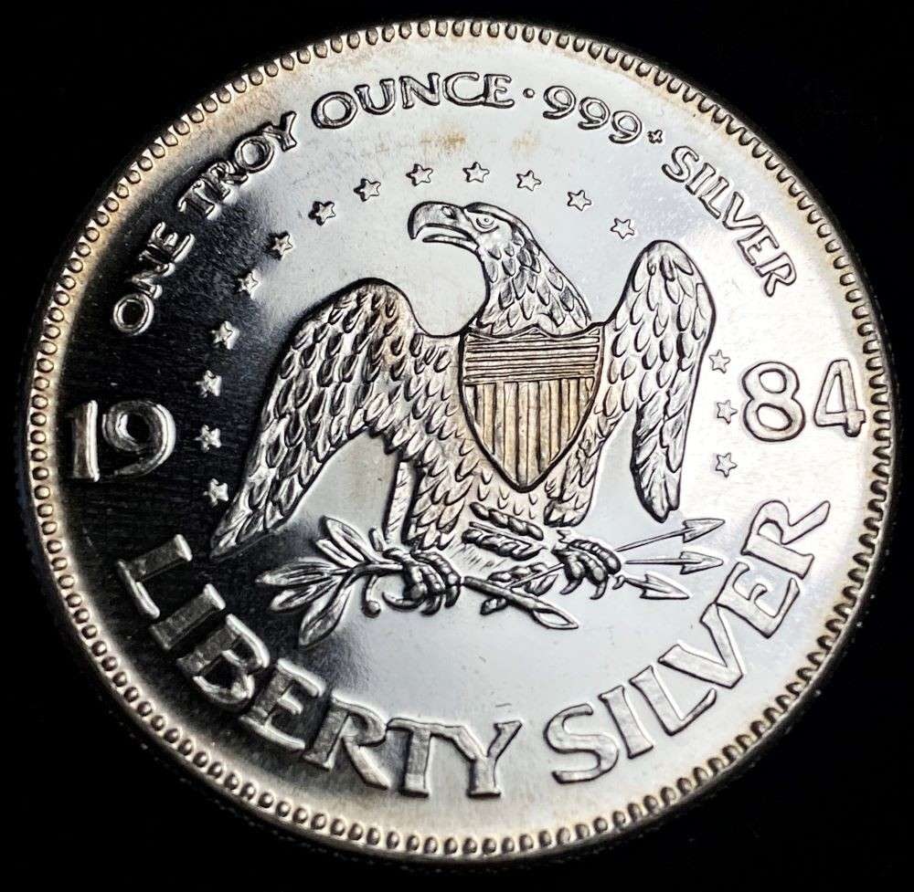1984 A-Mark "Life Liberty Happiness" Proof 1 ozt .999 Silver: Winner shall receive the exact coin shown here. (RR/B)