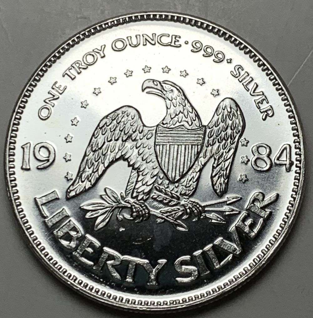 1984 A-Mark "Life Liberty Happiness" 1 ozt .999 Silver: Winner shall receive the exact coin shown here. (EP/B)