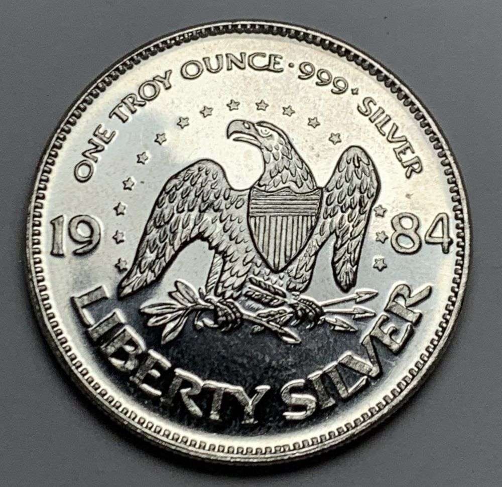 1984 A-Mark "Life Liberty Happiness" 1 ozt .999 Silver: Winner shall receive the exact coin shown here. (EP/B)