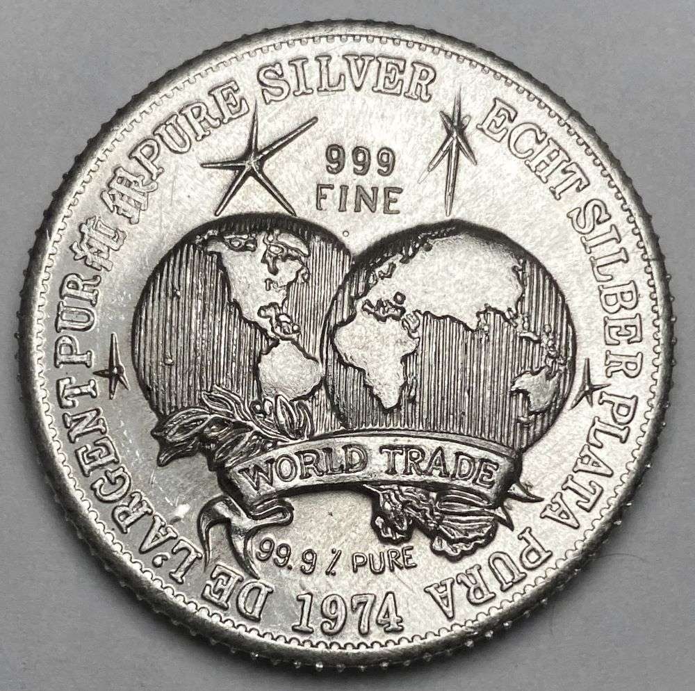 1974 The International Universal Trade Unit 1 ozt .999 Silver (1 of 2)