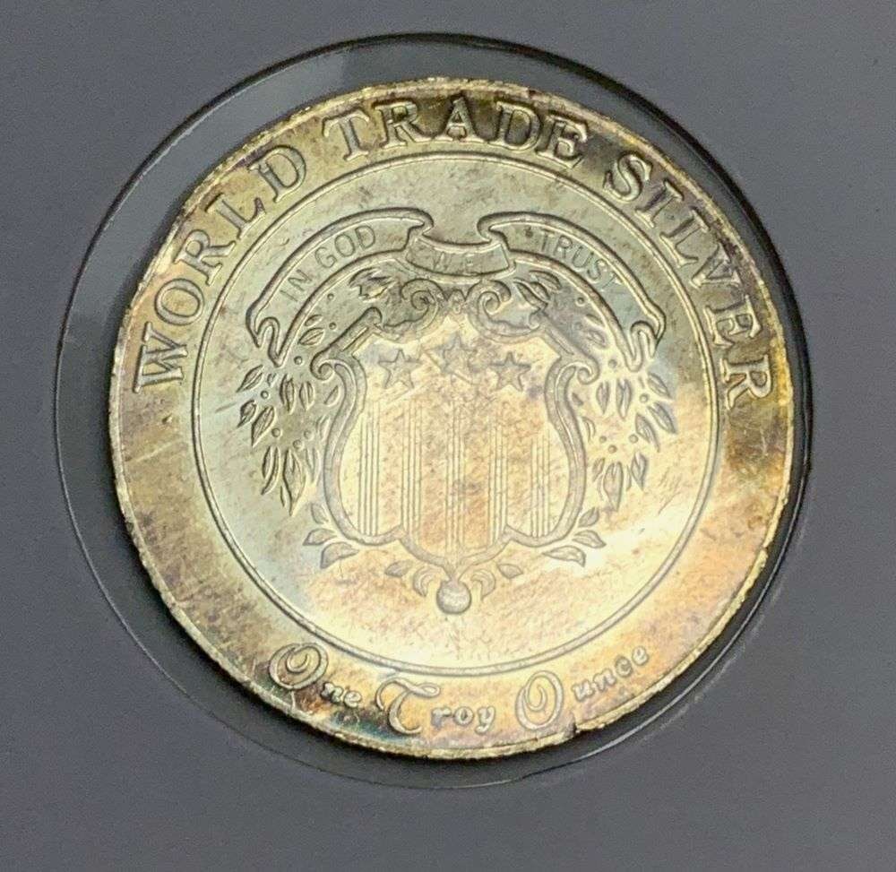 American Argent Mint LTD World Trade 1 ozt .999 Silver: Winner shall receive the exact coin shown here. (EP/B)
