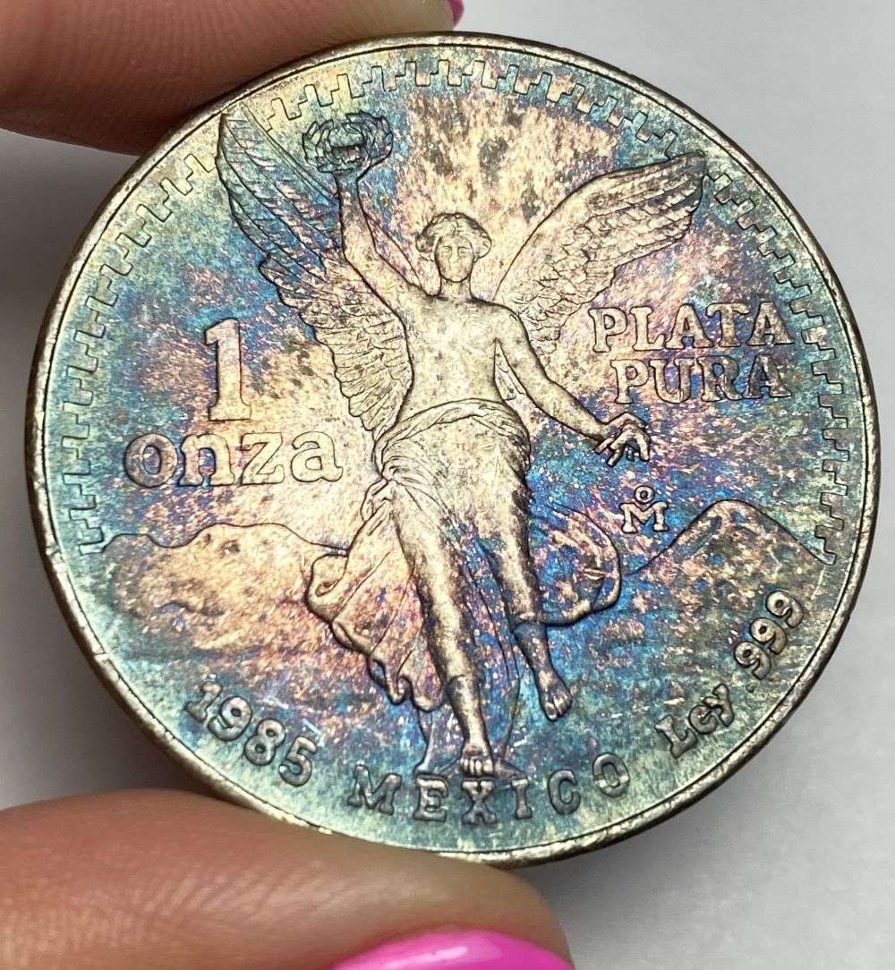 Rainbow 1985 Mexico Libertad 1 ozt .999 Silver: Winner shall receive the exact coin shown here. (RR)
