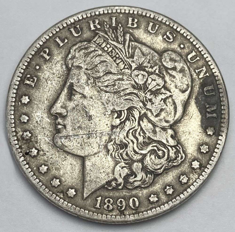 1890-CC Morgan Silver Dollar VF Damage (1 of 2)
