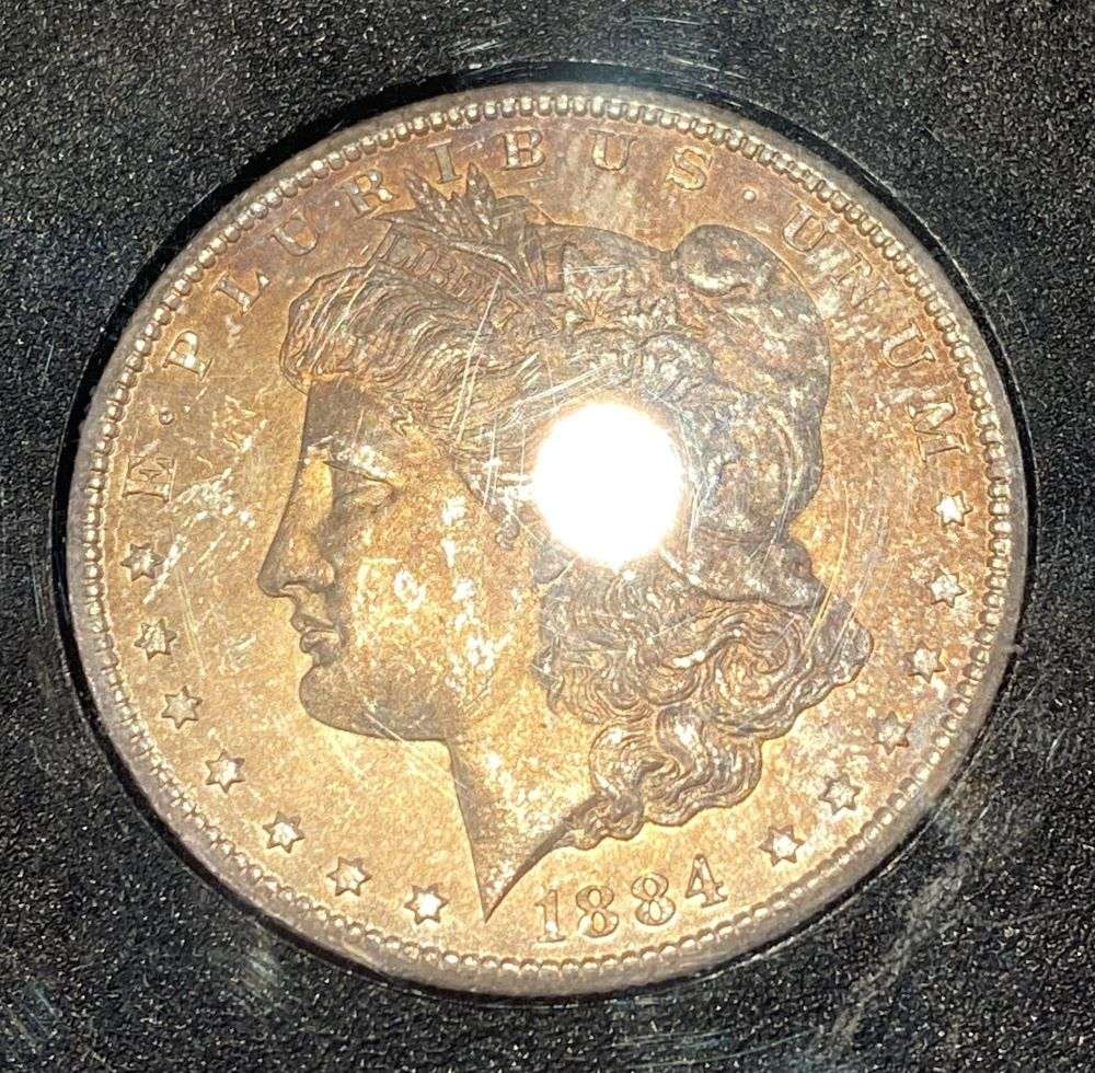 Nice Color 1884-CC Morgan Silver Dollar MS65 GSA: Winner shall receive the exact coin shown here. (RR/EBB)