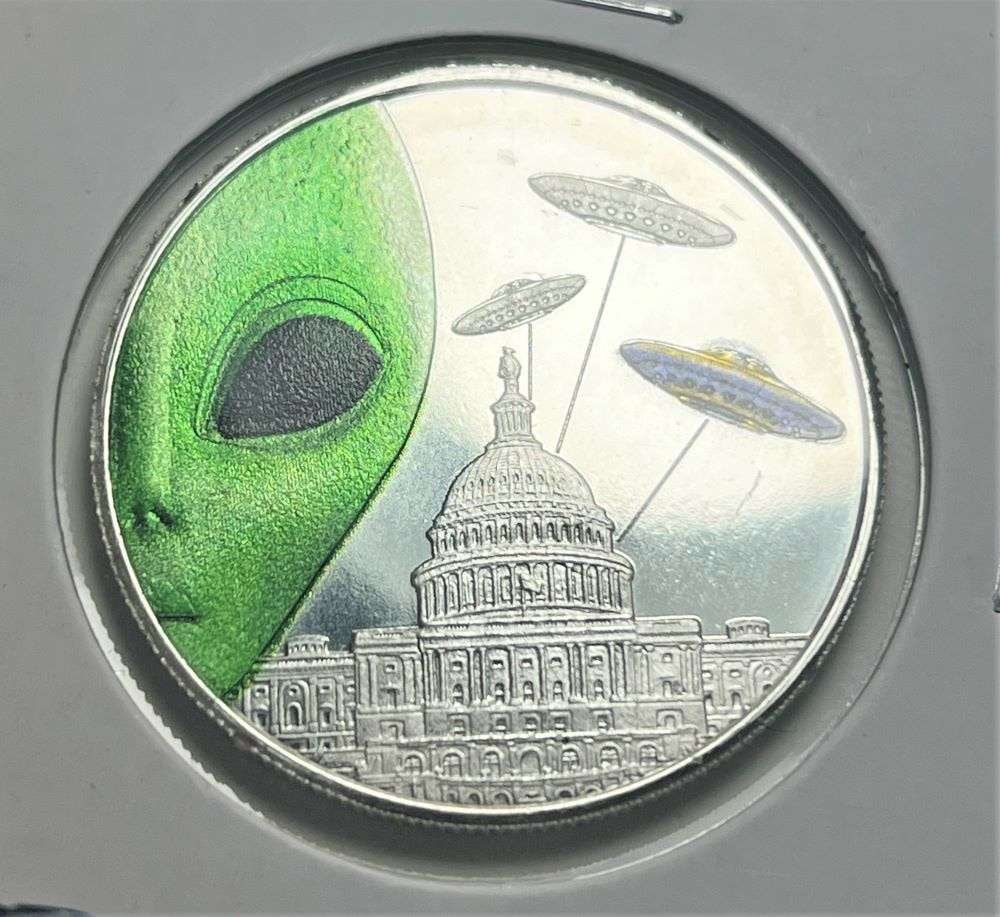 The Aliens Are Coming 1 ozt .999 Silver: Winner shall receive the exact coin shown here. (BD/B)