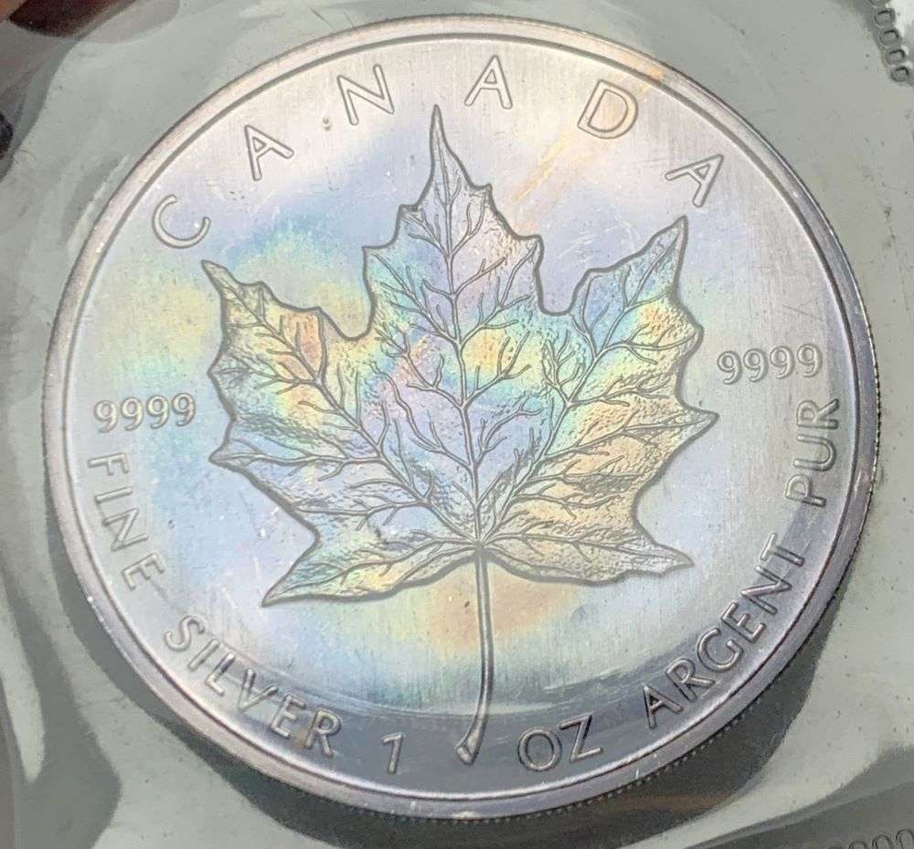 Toned 1988 Canada $5 Maple Leaf 1 ozt .9999 Silver: Winner shall receive the exact coin shown here. (BD/B)