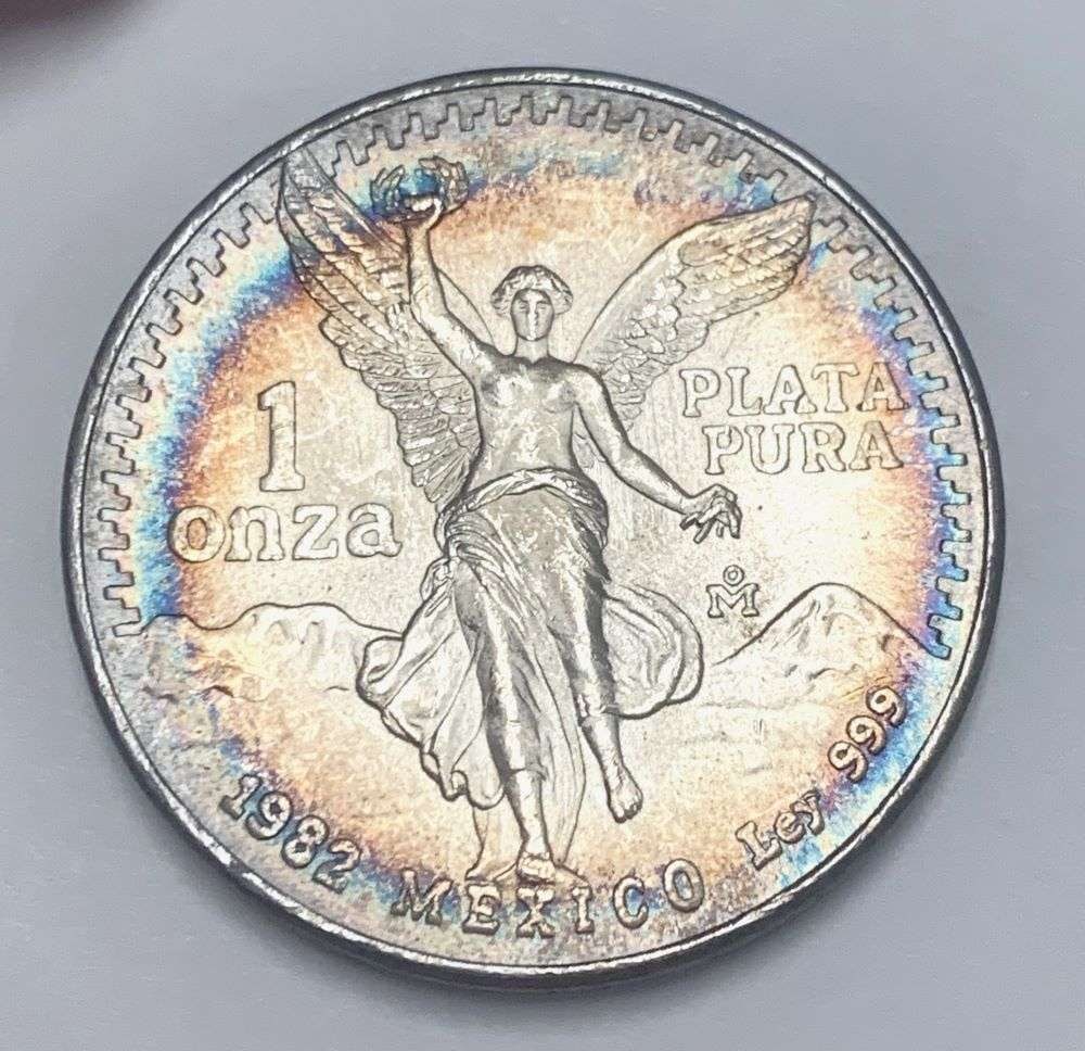 Colorful Toning 1982 Mexican Libertad 1 ozt .999 Silver: Winner shall receive the exact coin shown here. (BD/B)