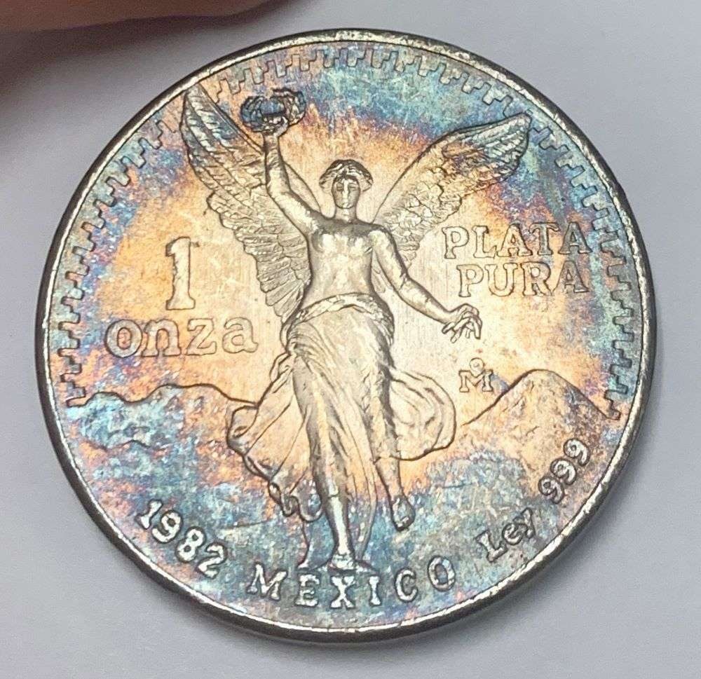 Colorful Toning 1982 Mexican Libertad 1 ozt .999 Silver: Winner shall receive the exact coin shown here. (BD/B)