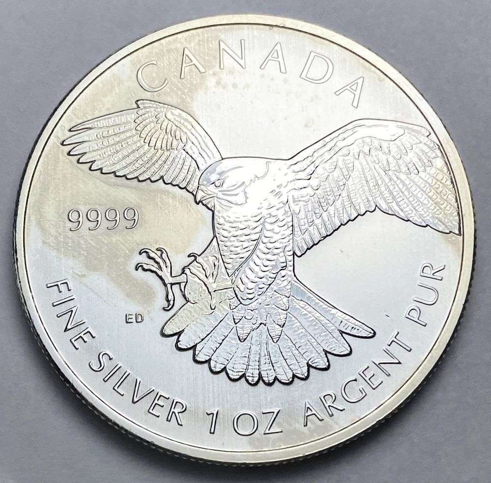 2014 Canada $5 Peregrine Falcon 1 ozt .9999 Silver: Winner shall receive the exact coin shown here. (RR/B)