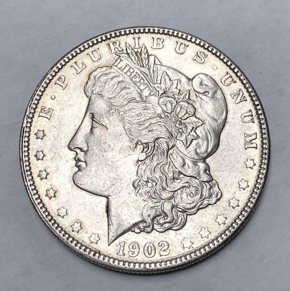 1902 Morgan Silver Dollar AU58: Winner shall receive the exact coin shown here. (BD/B)