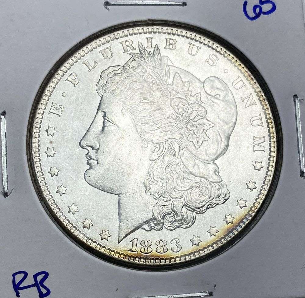 1883 Morgan Silver Dollar MS65: Winner shall receive the exact coin shown here. (RR/RB)