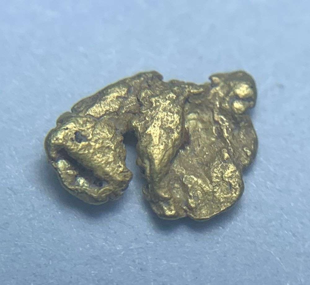 California Gold Rush Gold Nugget 4 Grains: These gold nuggets were panned a generation ago by a lonely miner in northern California. The claim is that these nuggets are almost 24 karat. Winner shall receive the exact item shown here. (BD/B)