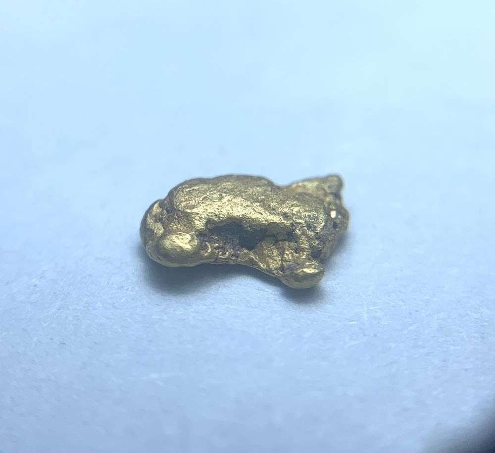 California Gold Rush Gold Nugget 6 Grains: These gold nuggets were panned a generation ago by a lonely miner in northern California. The claim is that these nuggets are almost 24 karat. Winner shall receive the exact item shown here. (BD/B)