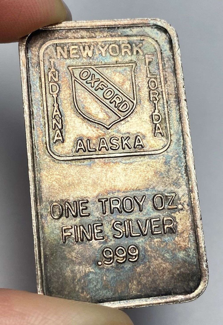 Toned Oxford 1 ozt .999 Silver Bar: Winner shall receive the exact bar shown here. (RR/B)