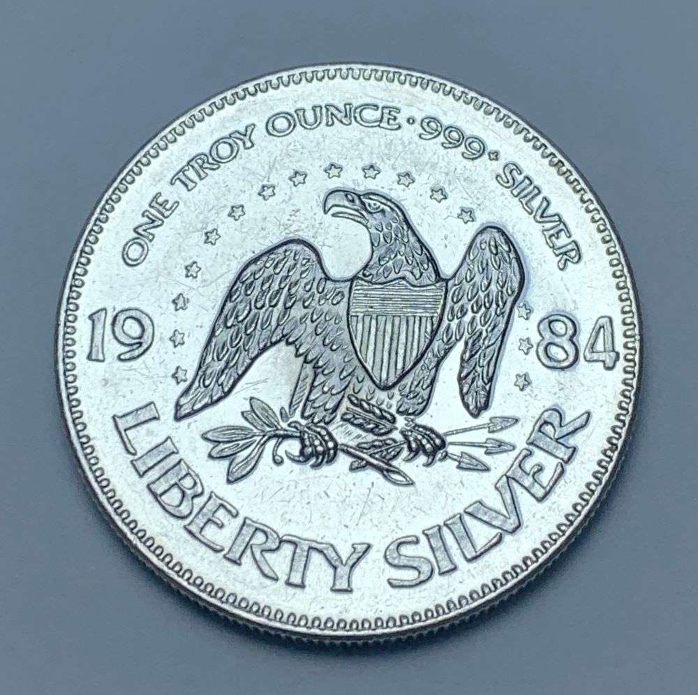 1984 A-Mark "Life Liberty Happiness" 1 ozt .999 Silver: Winner shall receive the exact coin shown here. (BD/B)