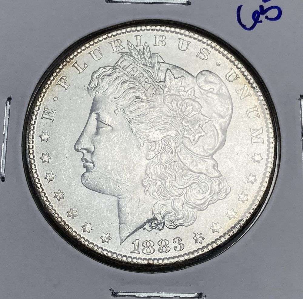 1883 Morgan Silver Dollar MS65: Winner shall receive the exact coin shown here. (RR/B)
