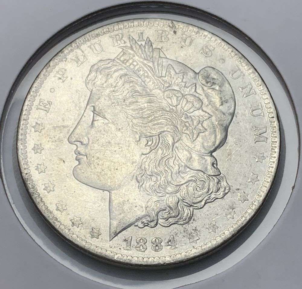 1884-O Morgan Silver Dollar MS64 (1 of 2)
