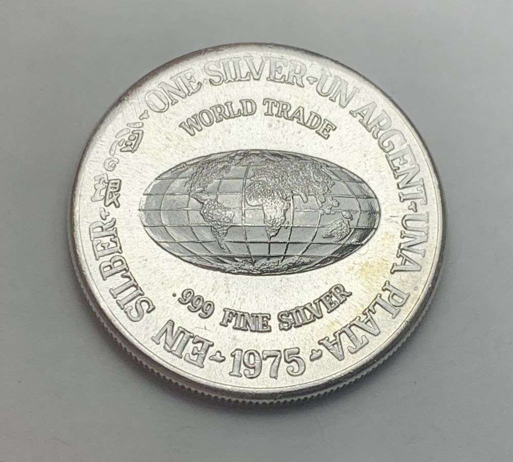 1975 World Trade 1 ozt .999 Silver Trade Unit: Winner shall receive the exact coin shown here. (BD/B)