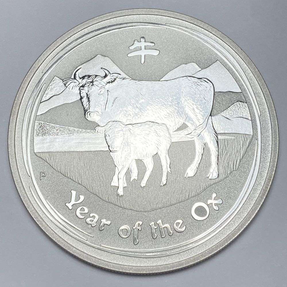 2009-P Australia Year of the Ox 1 ozt .999 Silver Dollar: Winner shall receive the exact coin shown here. (RR/TVC=EP)