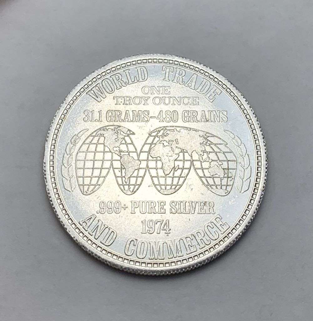 1974 World Trade And Commerce 1 ozt .999 Silver: Winner shall receive the exact coin shown here. (BD/B)