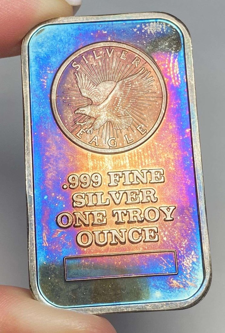 Toned Sunshine Minting Eagle 1 ozt .999 Silver Bar (1 of 2)