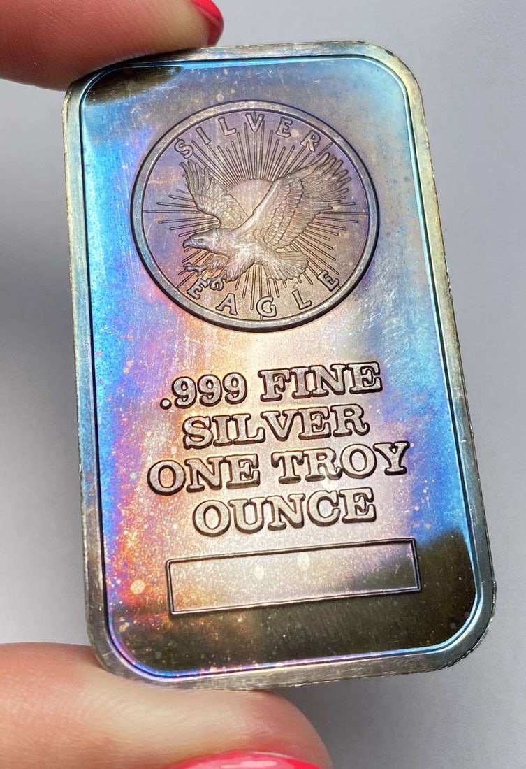 Toned Sunshine Minting Eagle 1 ozt .999 Silver Bar (1 of 2)