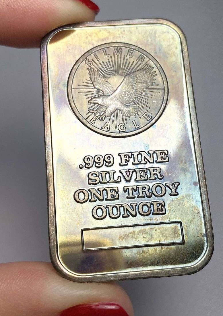 Toned Sunshine Minting Eagle 1 ozt .999 Silver Bar (1 of 2)
