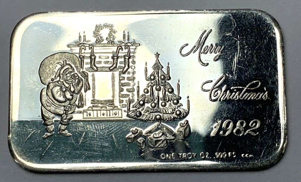 1982 Merry Christmas 1 ozt .999 Silver Bar: Winner shall receive the exact bar shown here. (RM/B)