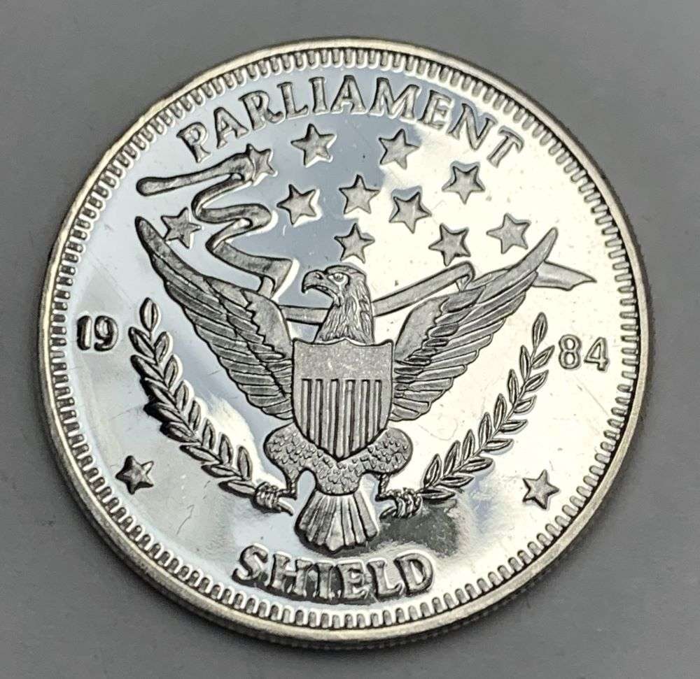 1984 Parliament Shield 1 ozt .999 Silver Trade Unit: Winner shall receive the exact coin shown here. (RM/B)
