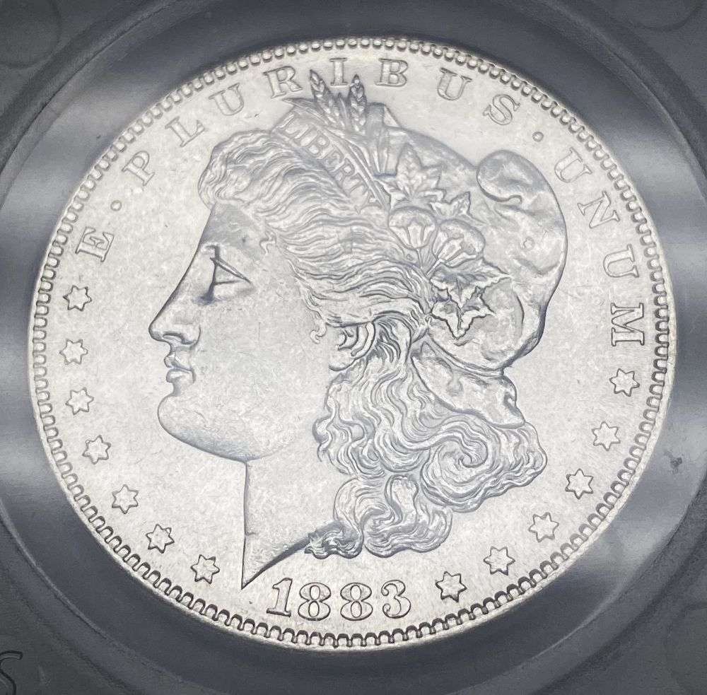 1883-S Morgan Silver Dollar MS63+: Winner shall receive the exact coin shown here. (RR/OUR)
