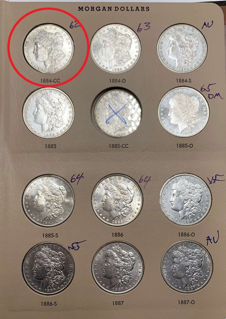 1884-CC Morgan Silver Dollar MS62 From Album: We got a Christmas consignment from a fastidious older great grandfather who has been collecting from over seven decades. Each coin was the best he could settle for, for the grade. We are proud to off