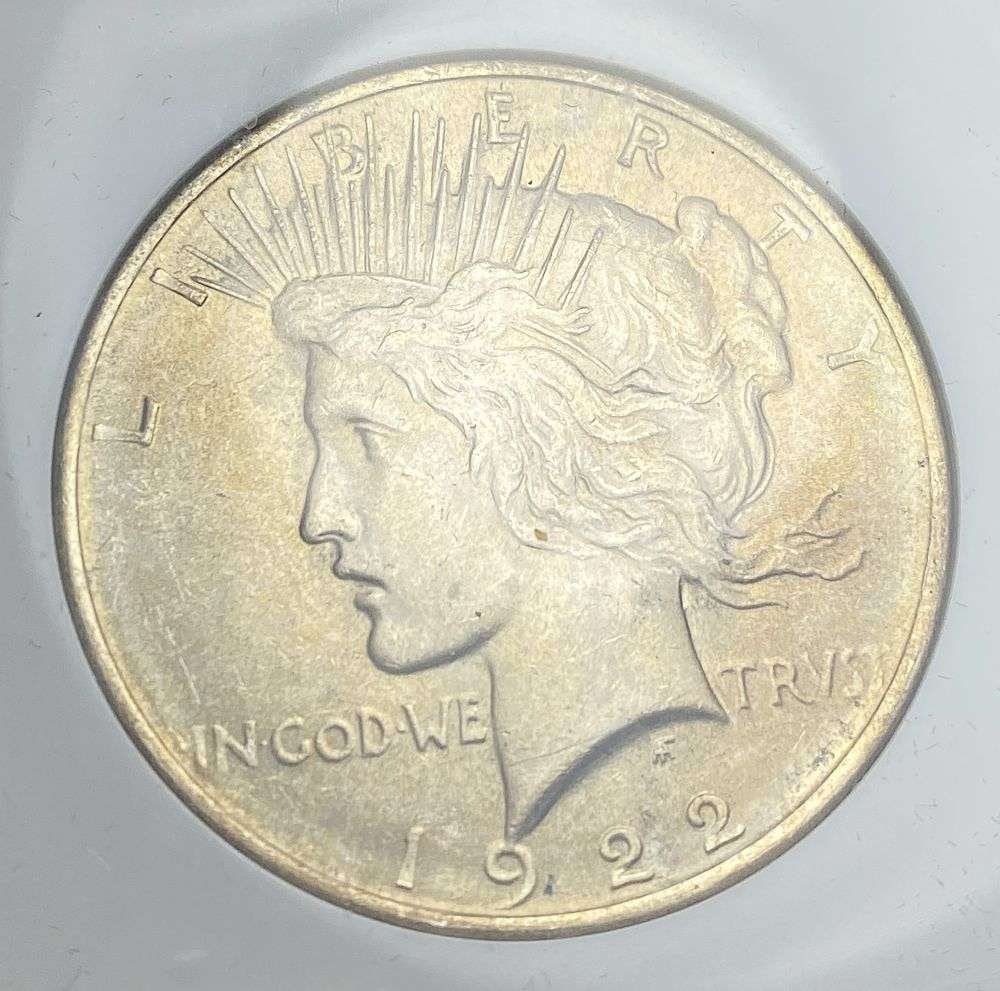 1922 Peace Silver Dollar MS66: IMPORTANT NOTE: We do not agree with the grade provided with this "off-brand" grading company. Winner shall receive the exact coin shown here. (RR)
