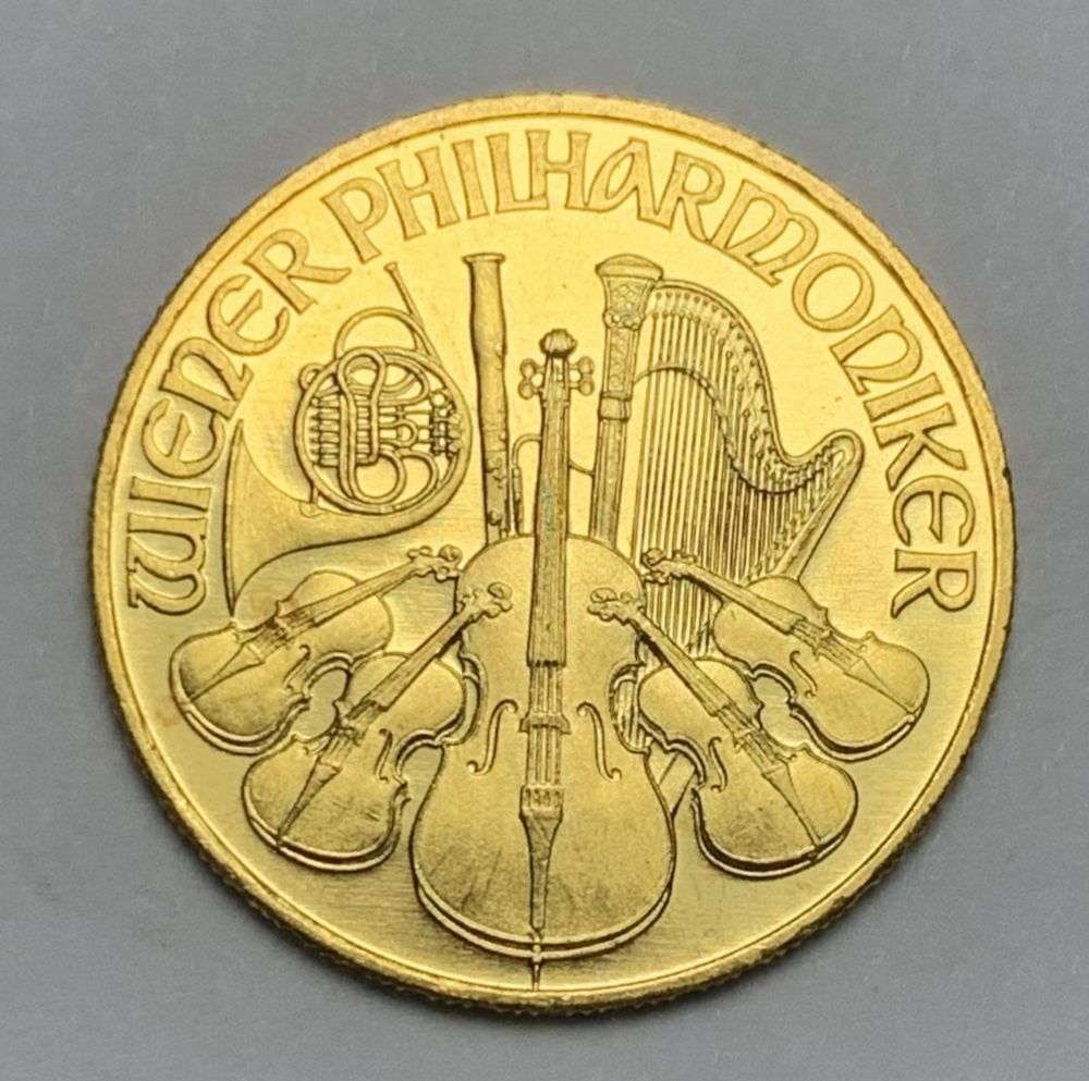 Last Minute! 1989 Austrian 999.9 Gold Philharmonic 1/4 oz: Winner shall receive the exact coin shown here. (MK/LBLU)
