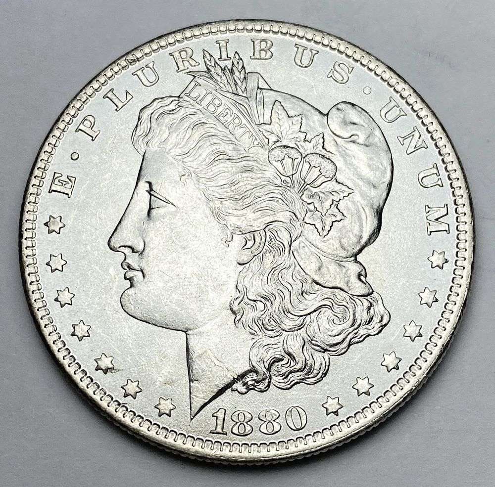 1880-O Morgan Silver Dollar MS64: Winner shall receive the exact coin shown here. (RM/UBB)