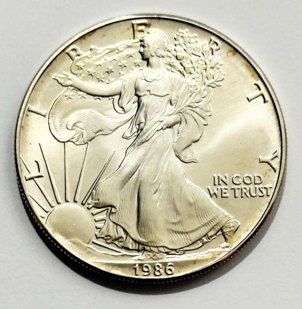 First Year 1986 American Silver Eagle: Winner shall receive the exact coin shown here. (SJ/B)