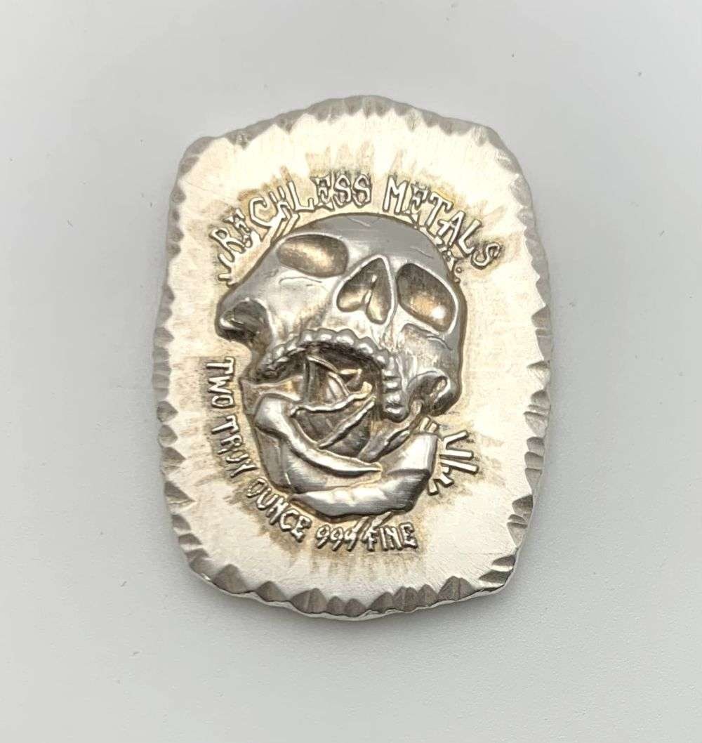 Rare Reckless Metals Skull 2 ozt .999 Silver Bar: Winner shall receive the exact bar shown here. (RM/B)