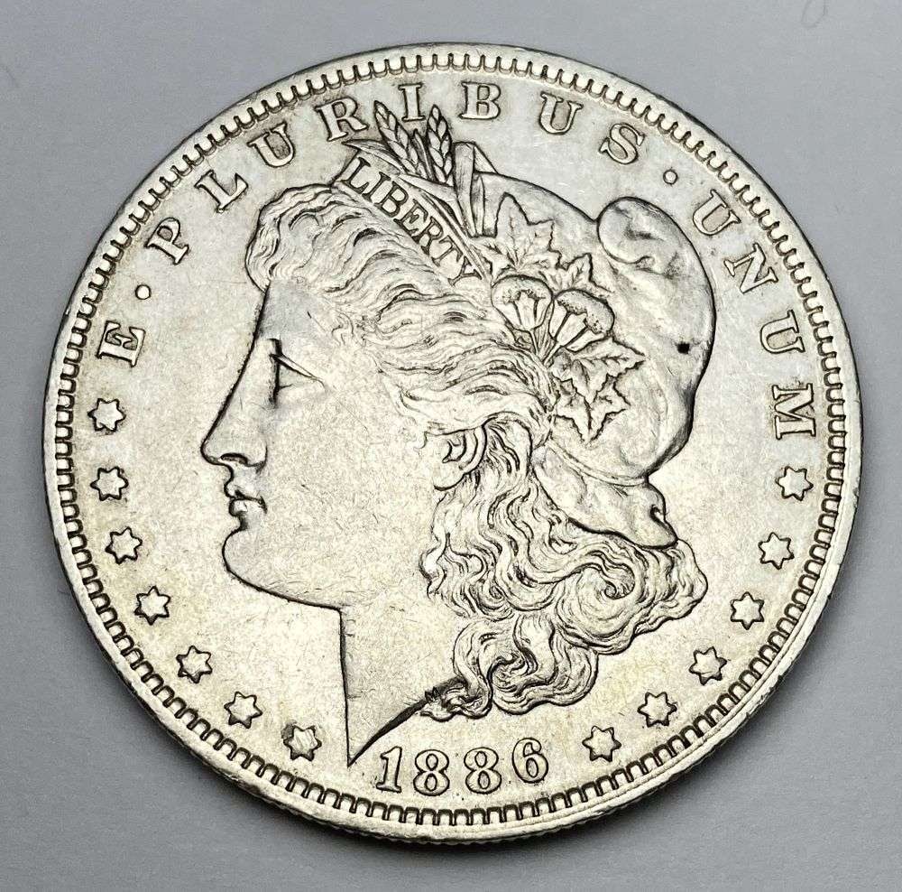 1886-O Morgan Silver Dollar AU55 (1 of 2)