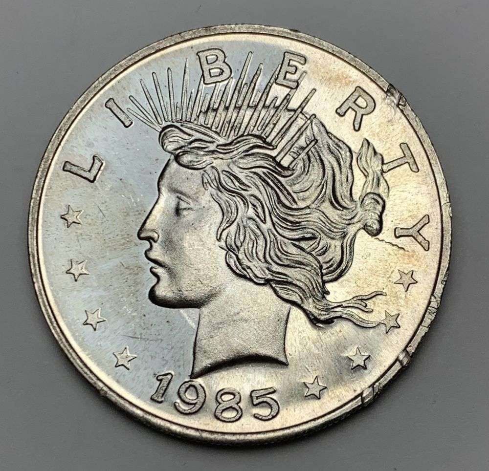1985 Peace Dollar Design 1 ozt .999 Silver Trade Unit (1 of 2)