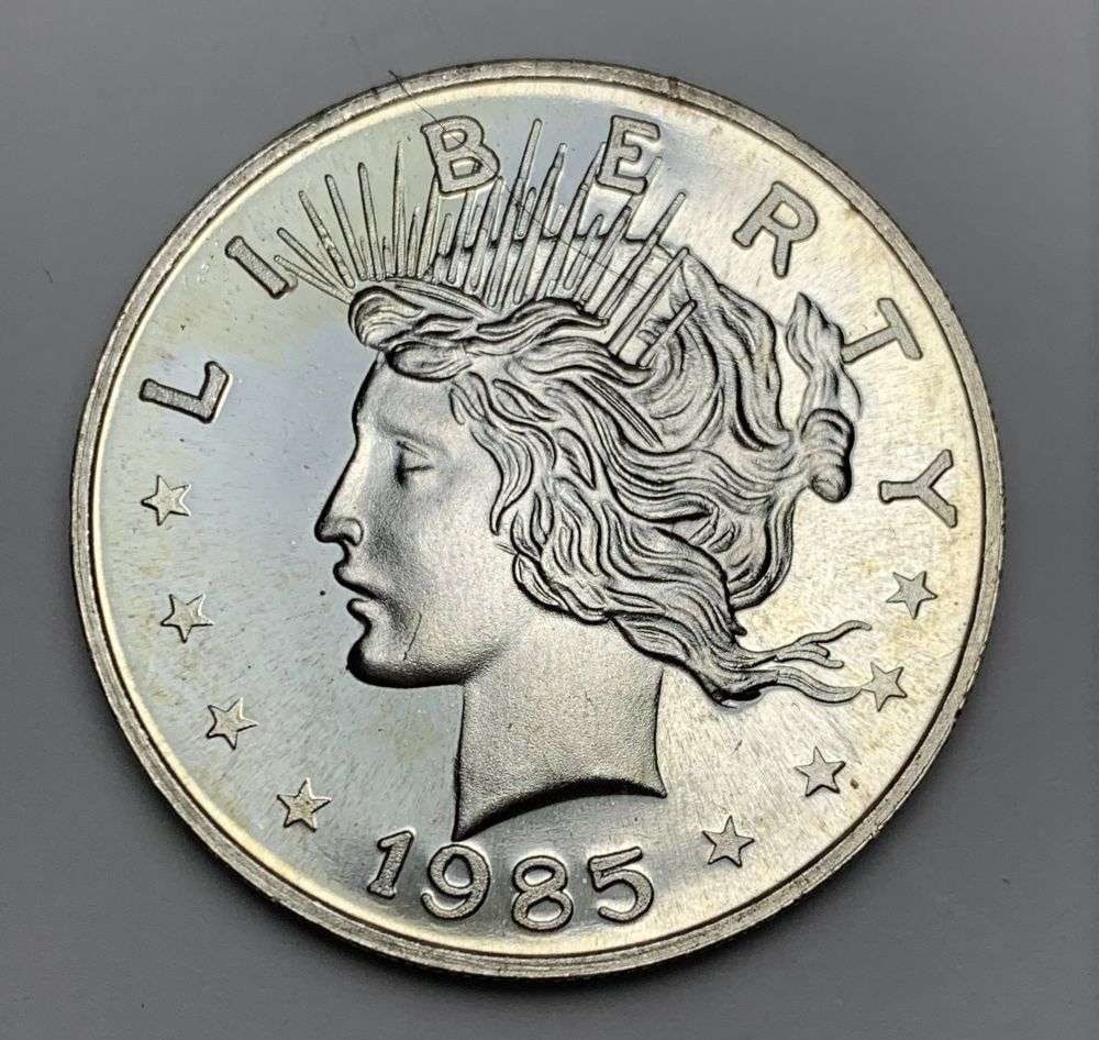 1985 Peace Dollar Design 1 ozt .999 Silver Trade Unit (1 of 2)