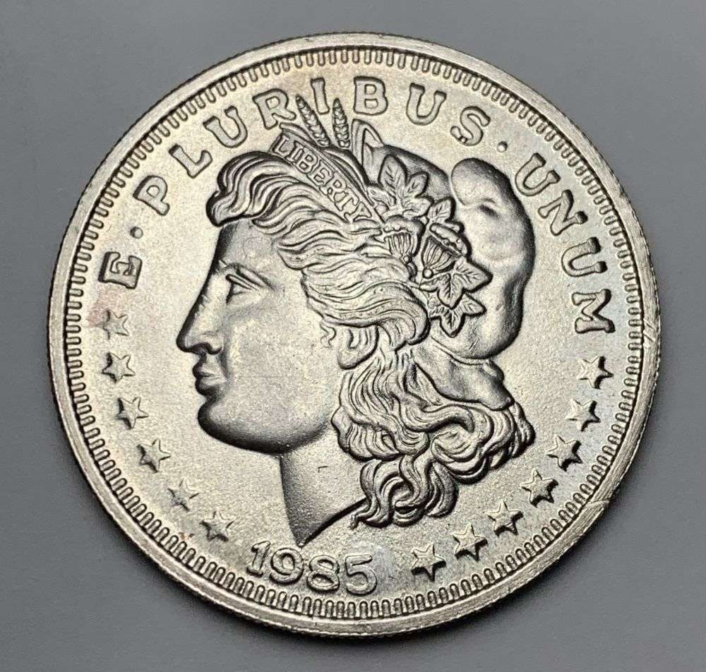 1985 Morgan Dollar Design 1 ozt .999 Silver Trade Unit (1 of 2)