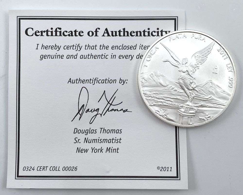 2011 Mexican Libertad 1 ozt .999 Silver: Winner shall receive (1) coin precisely resembling the one shown here. (RR/B)