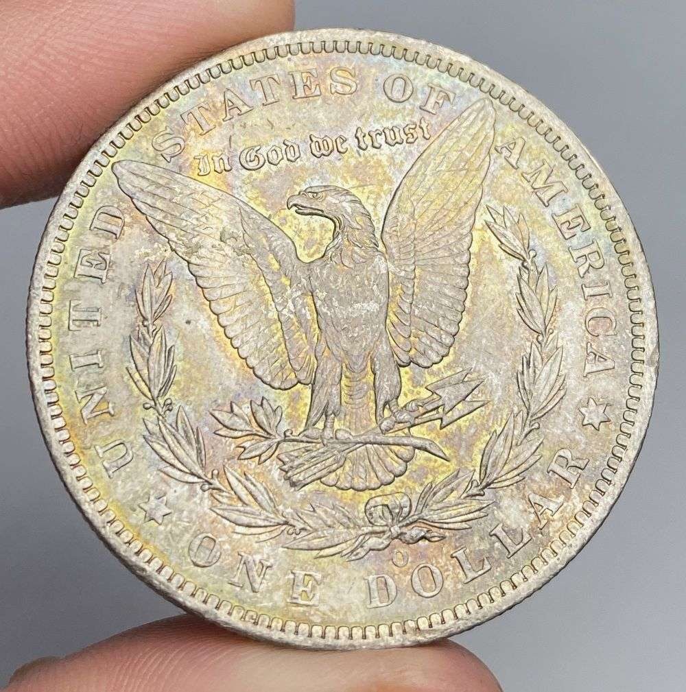 Nice Color 1885-O Morgan Silver Dollar: Winner shall receive the exact coin shown here. (RR/EB)