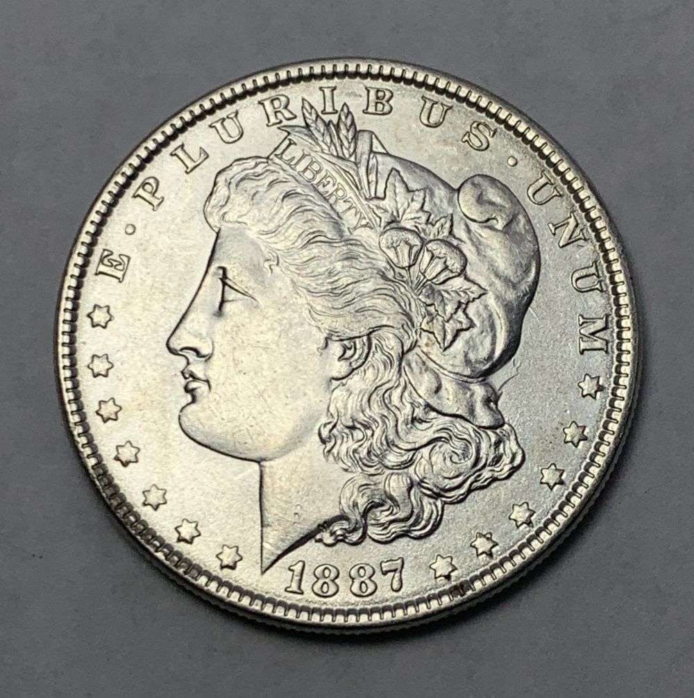 1887 Morgan Silver Dollar MS64 (1 of 2)