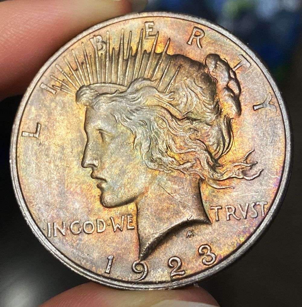 Monster Color 1923 Peace Silver Dollar MS65: Winner shall receive the exact coin shown here. (RR/B)