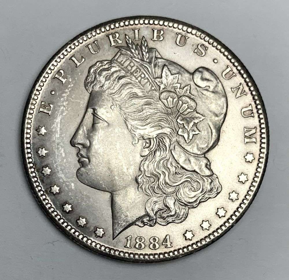 1884-CC Morgan Silver Dollar MS62: Winner shall receive the exact coin shown here. (RM/UR)